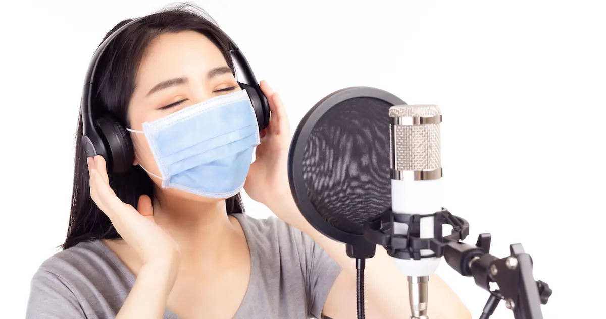 Keep yourself safe: image of voice actor wearing mask